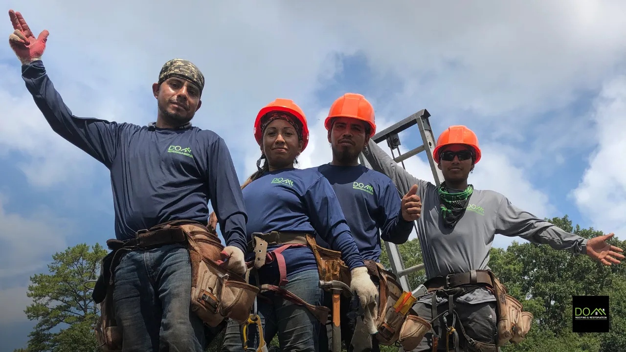 The professional team of Dom Roofing & Restoration, a local company providing expert roofing services for homeowners in the Sugar Hill area.