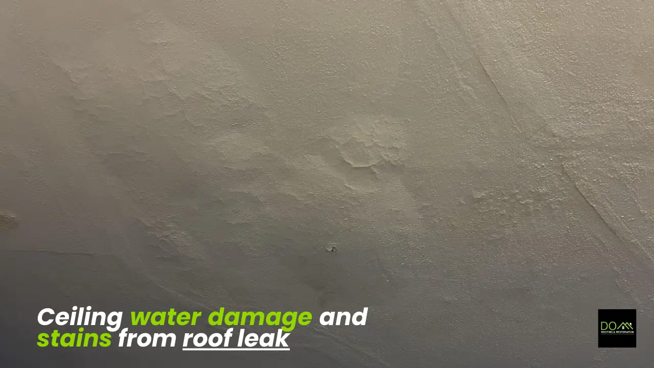 Interior ceiling water damage and stains from roof leak requiring Dom Roofing & Restoration emergency services in Buford GA