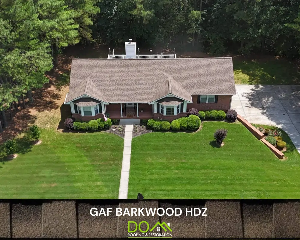 Close-up of GAF Timberline HDZ Barkwood shingles by Dom Roofing & Restoration Dunwoody GA