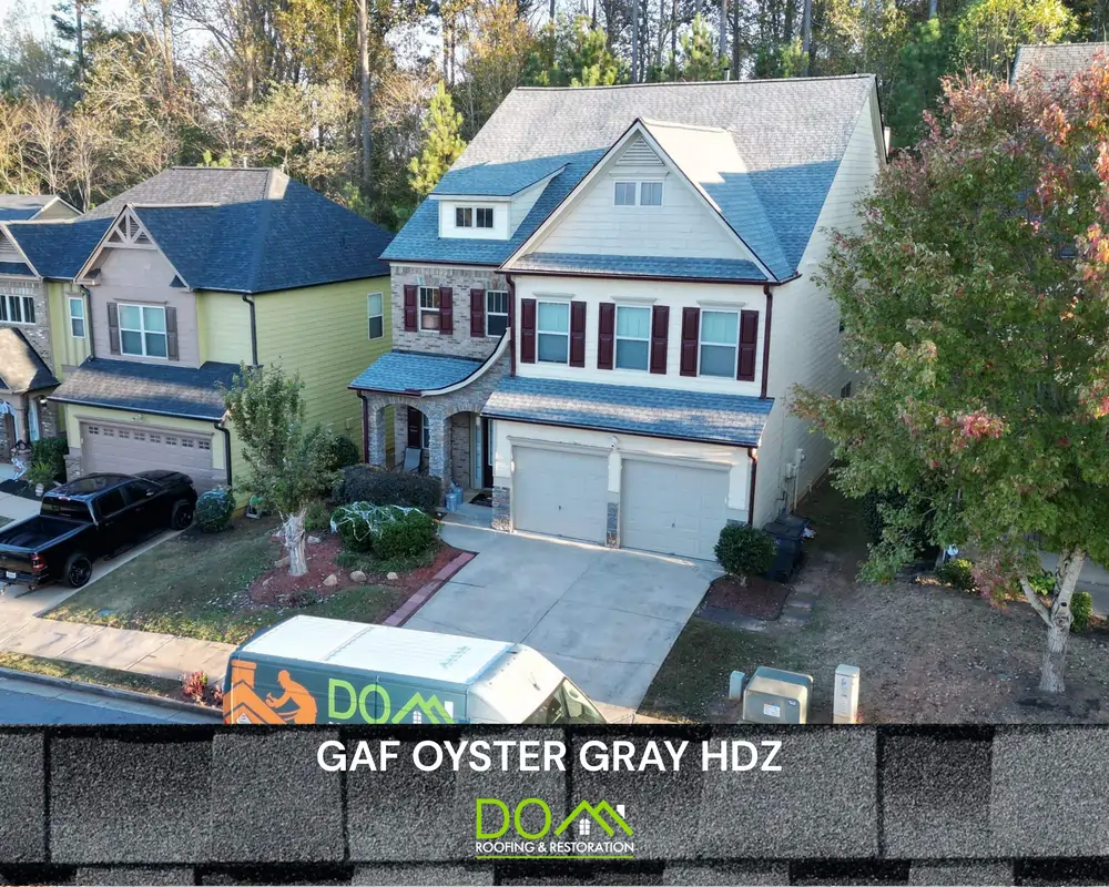 Close-up of GAF Timberline HDZ Oyster Grey shingles by Dom Roofing & Restoration Suwanee GA