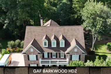 Roof replacement with GAF Barkwood HDZ shingles – Dom Roofing & Restoration – roof shingle color in Duluth.