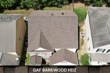Roof replacement with GAF Barkwood HDZ shingles – Dom Roofing & Restoration – roof shingle color in Suwanee.