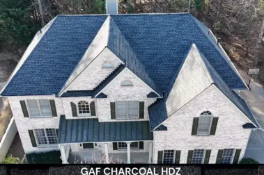 Roof replacement with GAF Charcoal UHDZ shingles – Dom Roofing & Restoration – roof shingle color in Duluth.