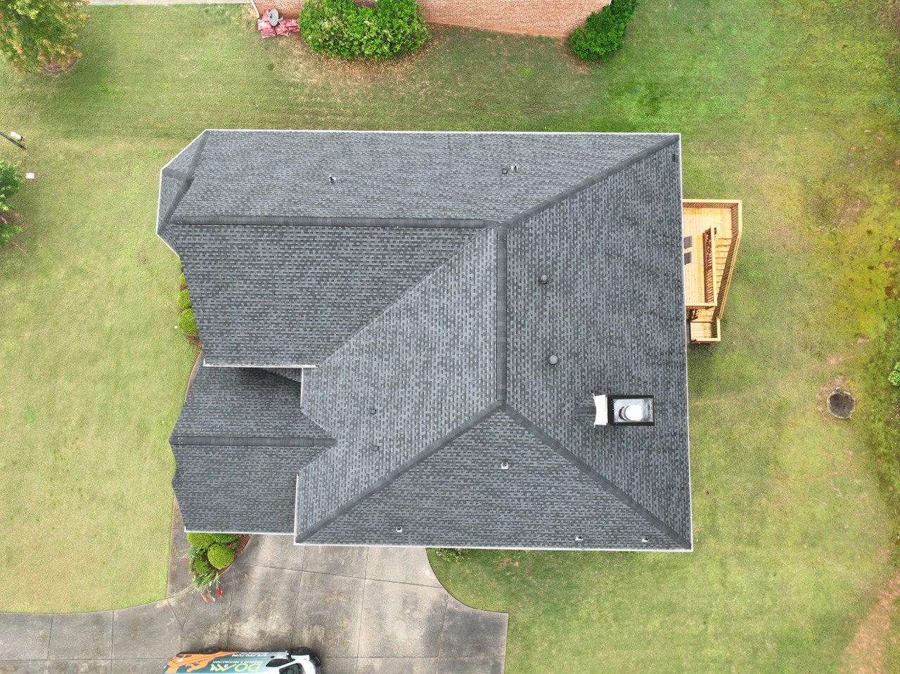 Norcross, GA Roofing | Dom Roofing & Restoration 2 Aerial view of a completed architectural shingle roof replacement by Dom Roofing, serving Norcross, GA