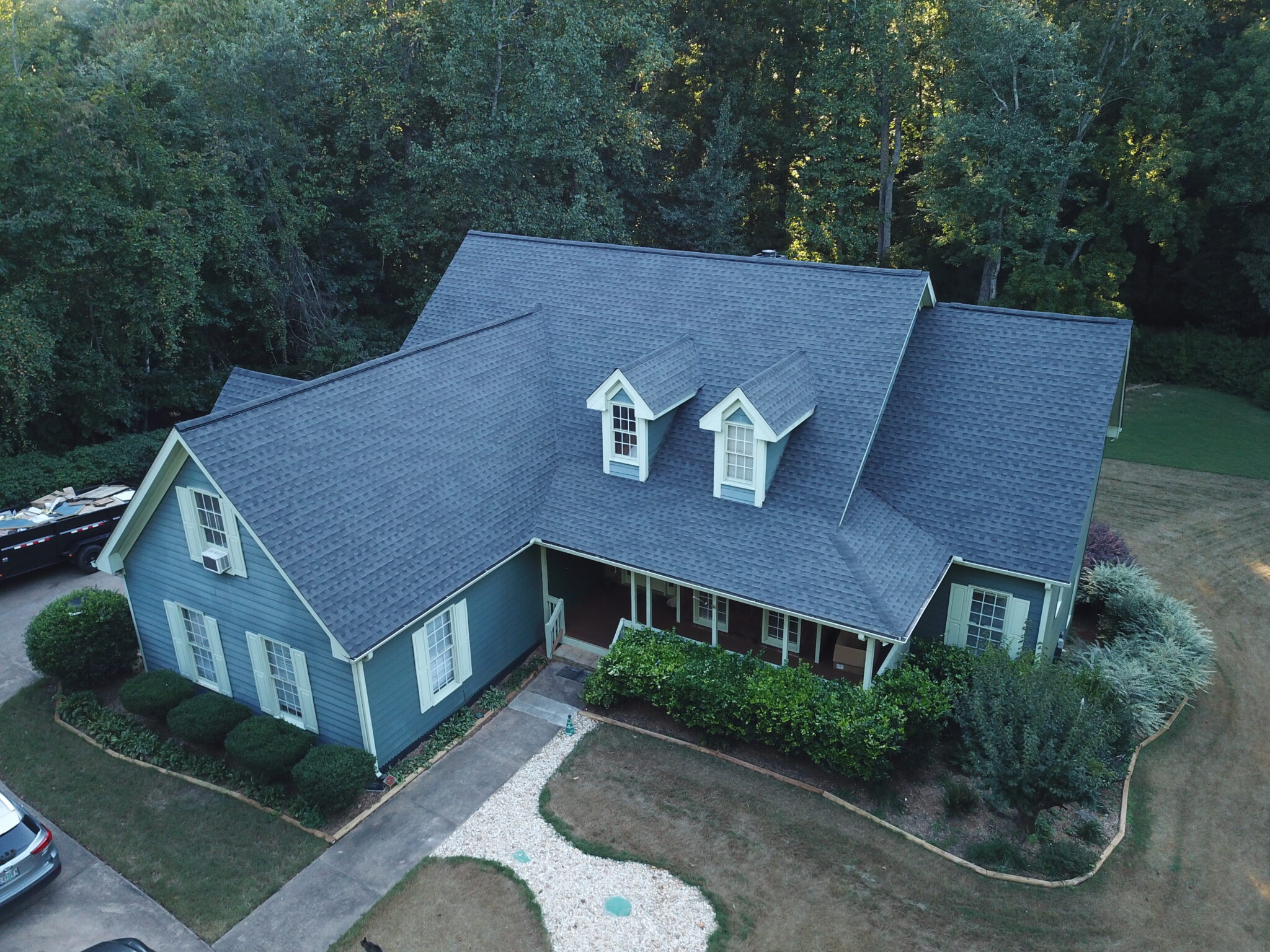 Roofing Contractor in Cumming, GA 1 Aerial view of a completed roof replacement on a home in Cumming, GA by Dom Roofing & Restoration