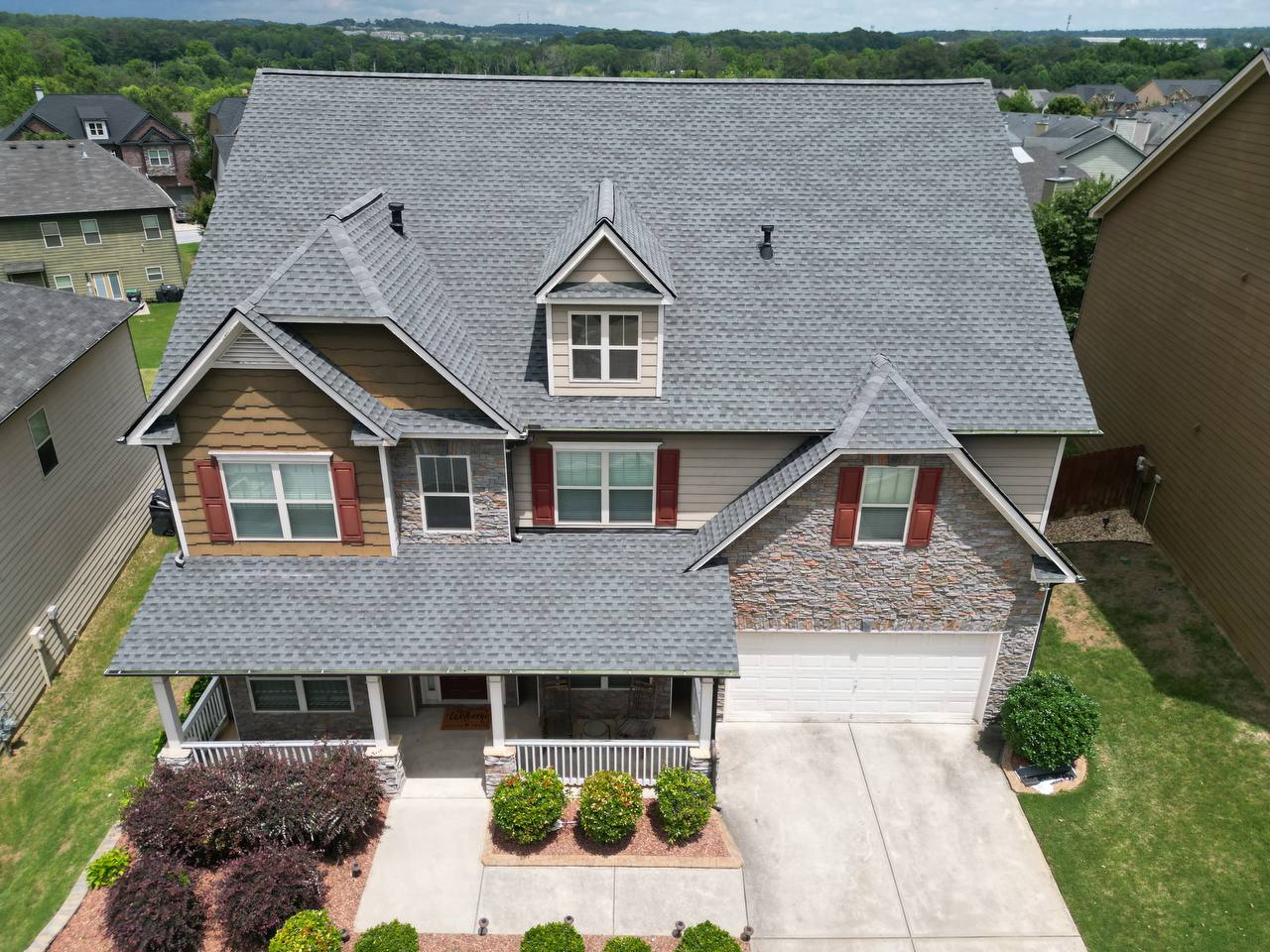 Dacula, GA Roofing | Dom Roofing & Restoration 1 Completed architectural shingle roof replacement on a craftsman two-story home by Dom Roofing, serving Dacula, GA