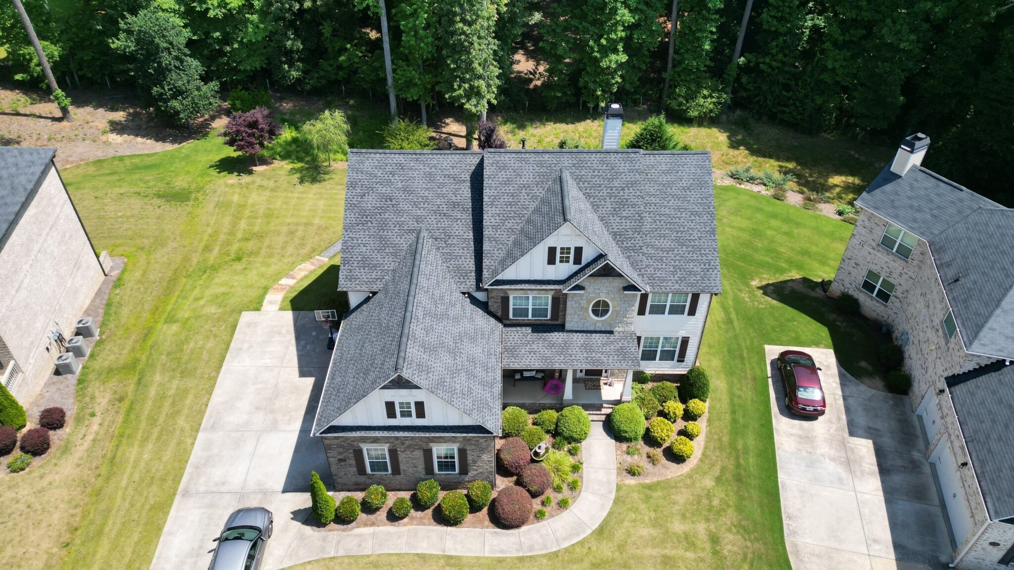Roofing Company in Milton, GA 1 New architectural shingle roof installed by Dom Roofing on a home in the Milton, GA area
