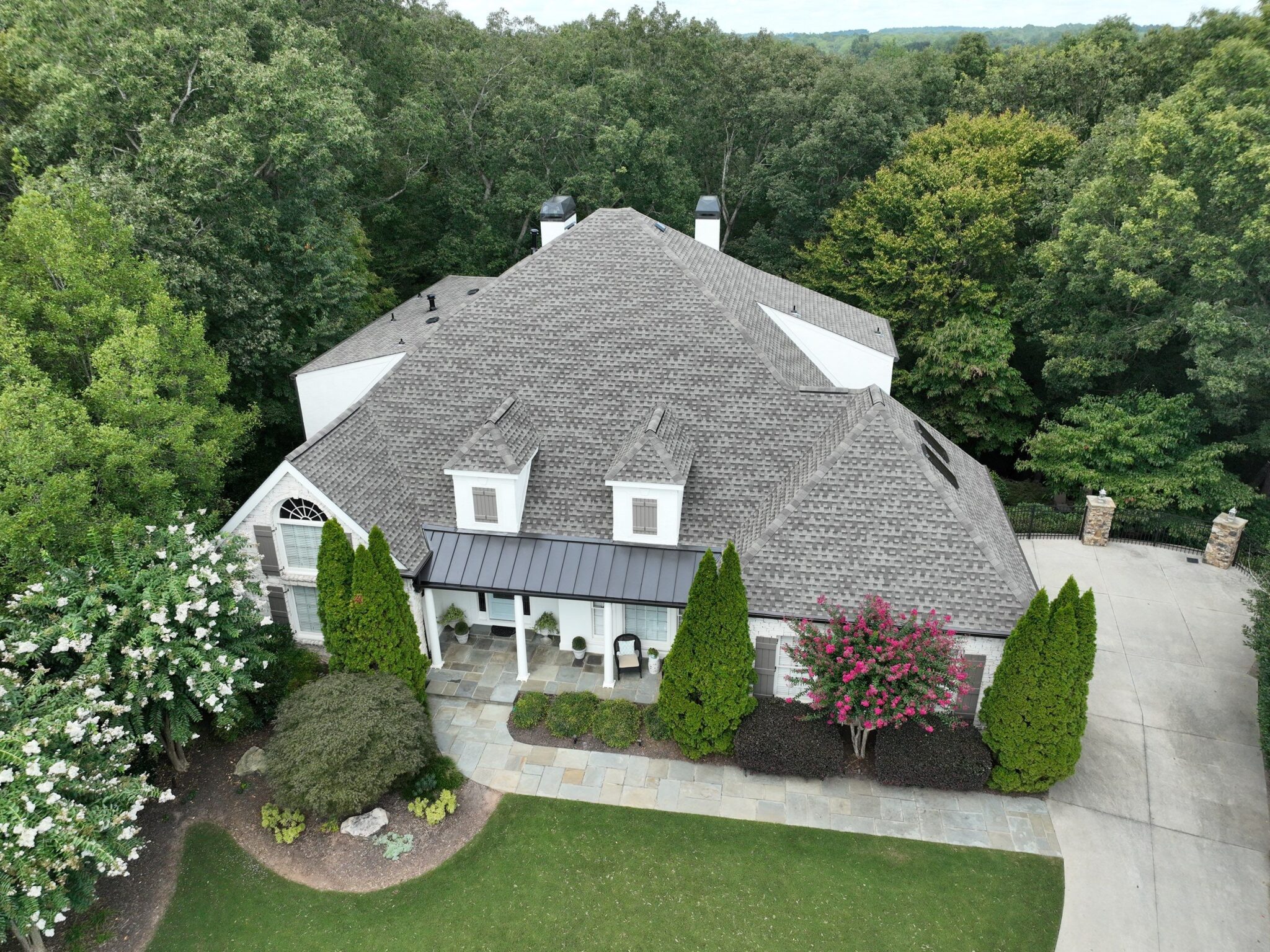 Peachtree Corners, GA Roofing | Dom Roofing & Restoration 1 New designer shingle roof with standing seam metal porch accent on a Peachtree Corners, GA home