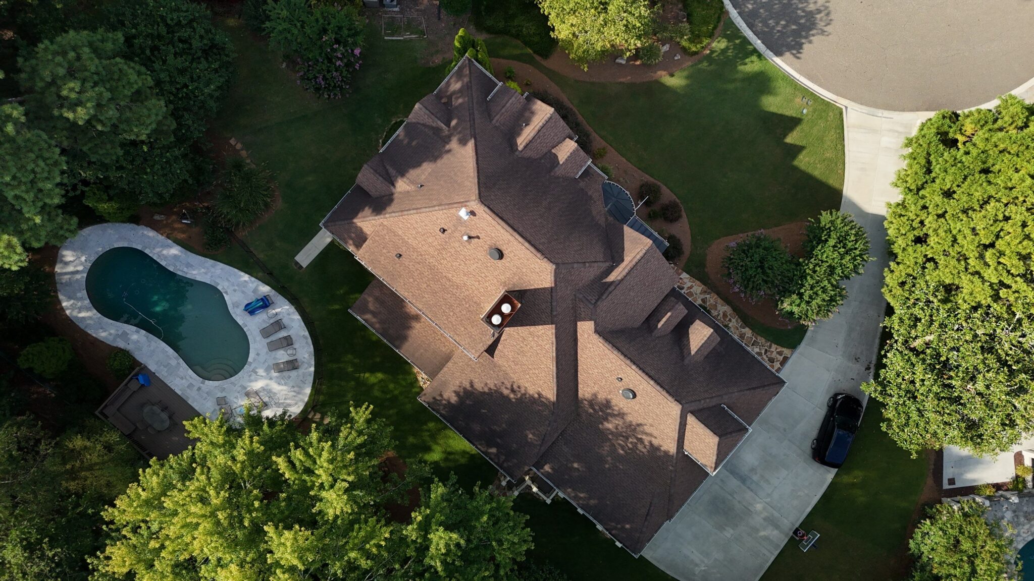 Roofing Company in Sandy Springs, GA 2 New shingle roof installed by Dom Roofing & Restoration in the Sandy Springs, GA area