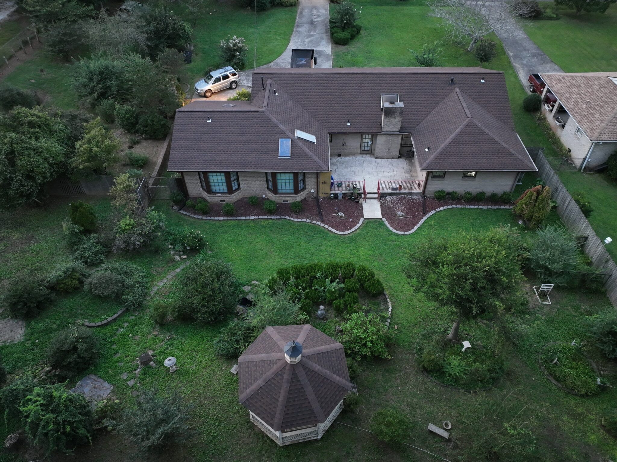 Snellville, GA Roofing | Dom Roofing & Restoration 2 Aerial view of a new shingle roof on a ranch home and matching gazebo in the Snellville, GA area