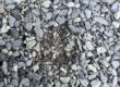 Close-up of a localized mark and granule loss on an asphalt shingle