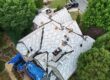 Aerial view of a roof covered with synthetic underlayment during installation